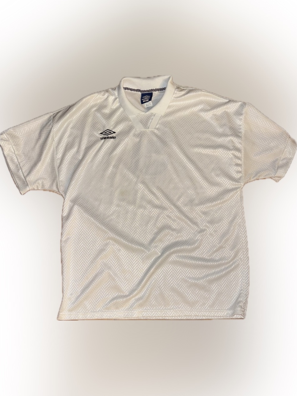Umbro White Short-Sleeve Soccer Jersey with Chevron Texture